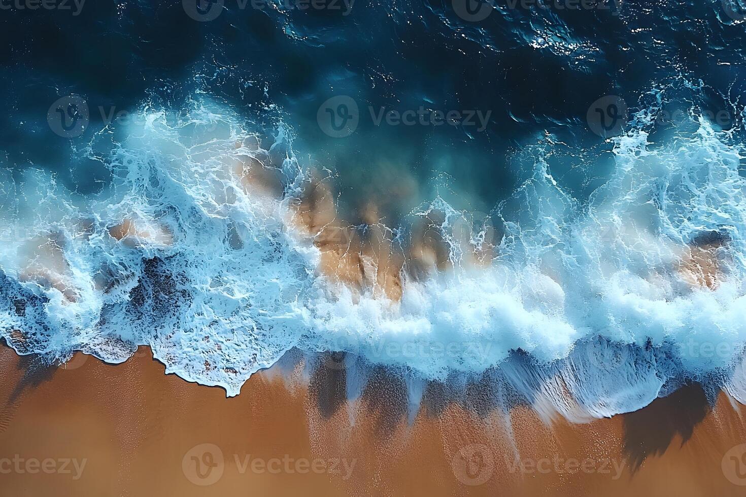 Aerial View of Ocean Waves Crashing on Sandy Beach Coastal Nature and Summer Vibes photo