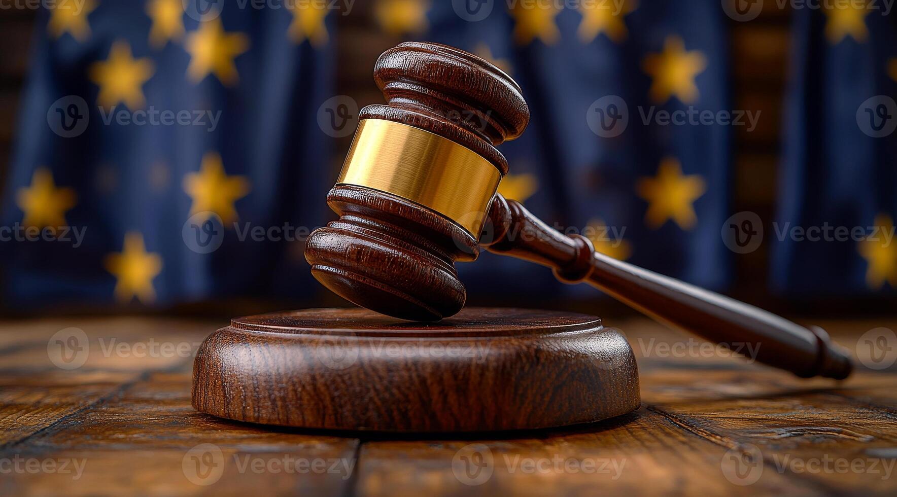 Gavel on wood in courtroom. A wooden gavel is placed on a round base, symbolizing authority in judicial settings, with a starry backdrop. photo