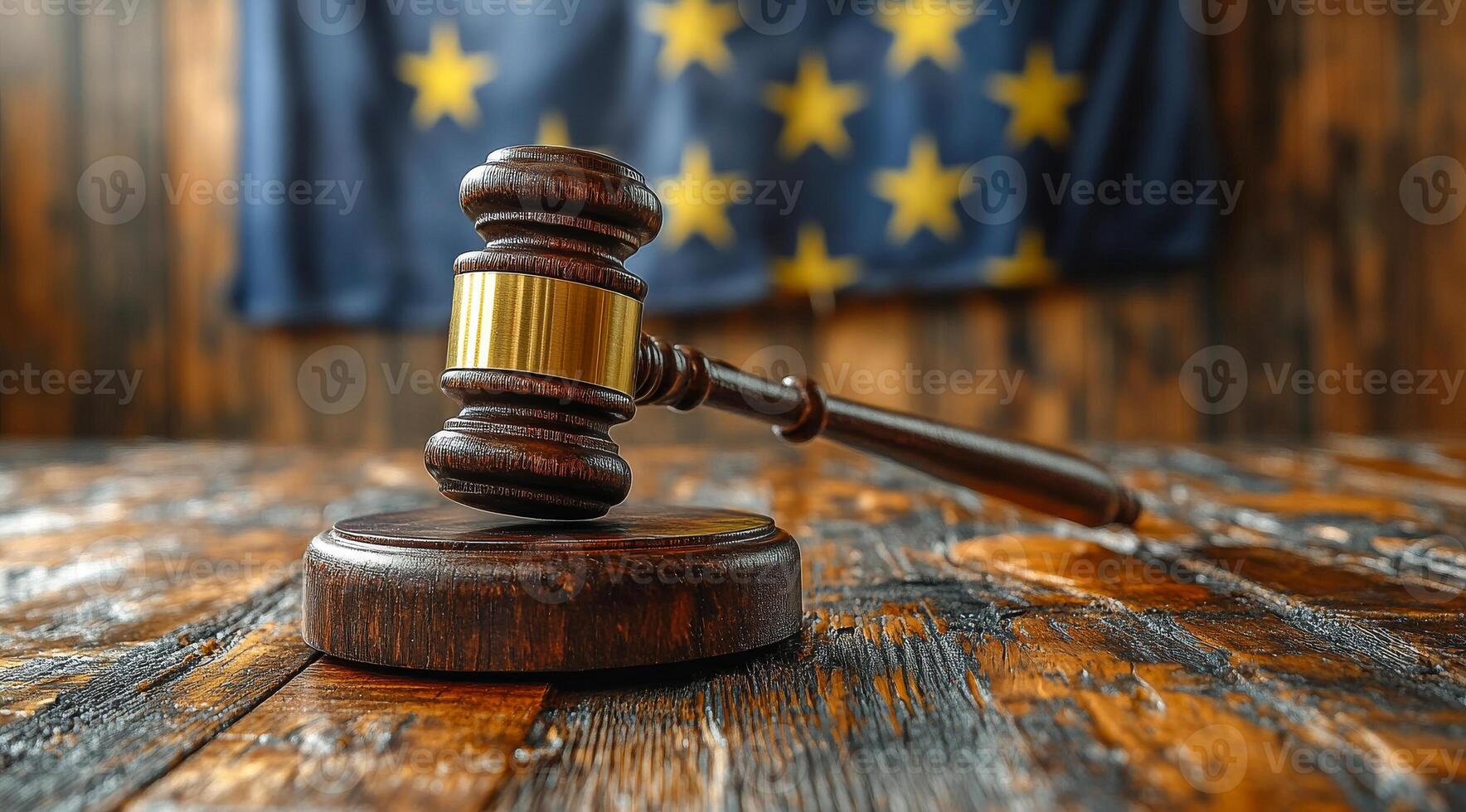Gavel on table with flag. A gavel is placed on a wooden table with an Alaska state flag in the background, symbolizing justice and law. photo