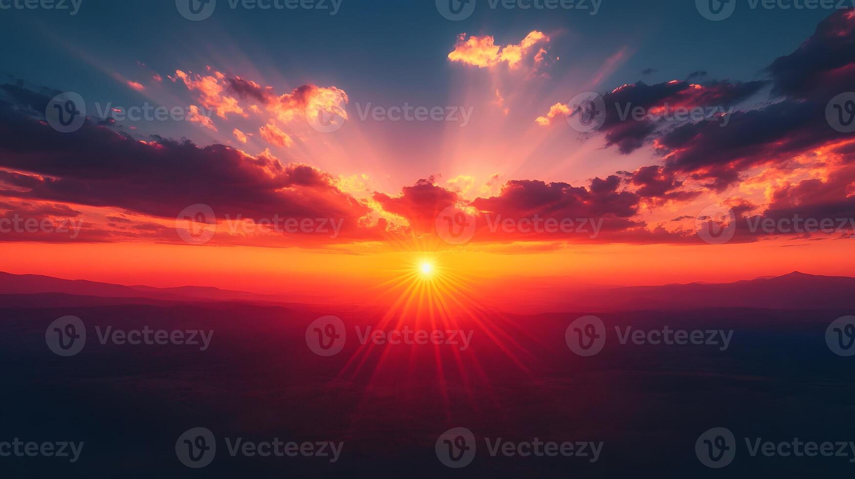 Dramatic sunset displays vibrant orange and deep red gradient with dark crimson clouds, creating majestic dusk horizon and ethereal evening glow in tranquil landscape composition. atmosphere photo