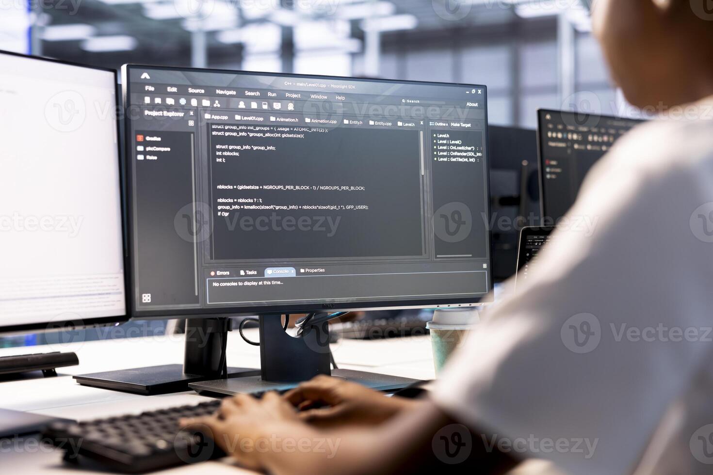 Cybersecurity worker monitoring security incidents affecting server farm network. Computer scientist in data center protecting company critical infrastructure from cyber threats photo