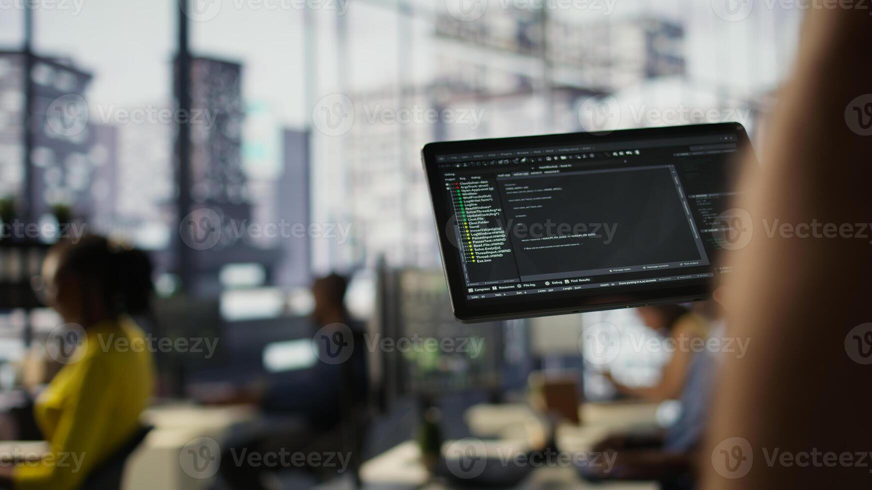 Data scientist uses tablet to check on machine learning models that can analyze data to automate decision making processes. Close up of IT specialist using device to do programming in office, camera B photo