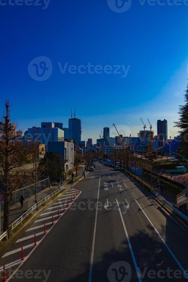 A timelapse of the street near the underconstruction at the business town in Tokyo photo