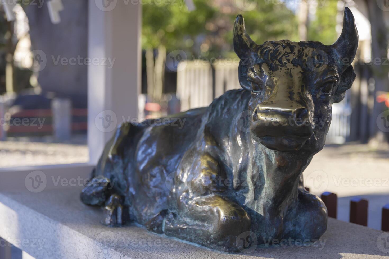 A guardian statue of cow at Kameido Tenjin shrine photo