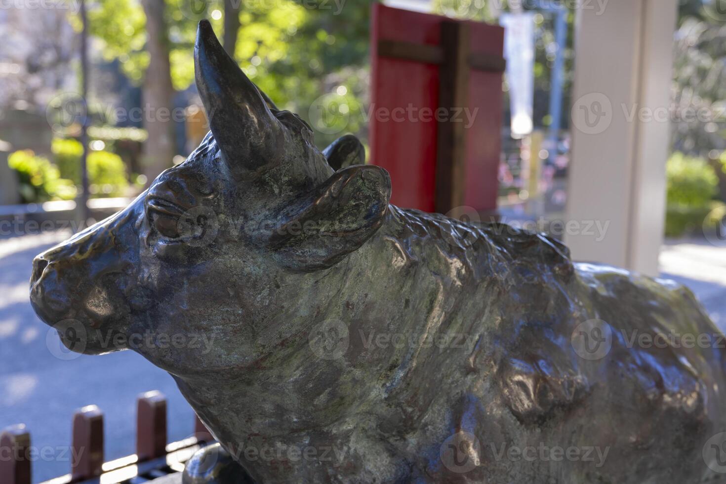A guardian statue of cow at Kameido Tenjin shrine closeup photo