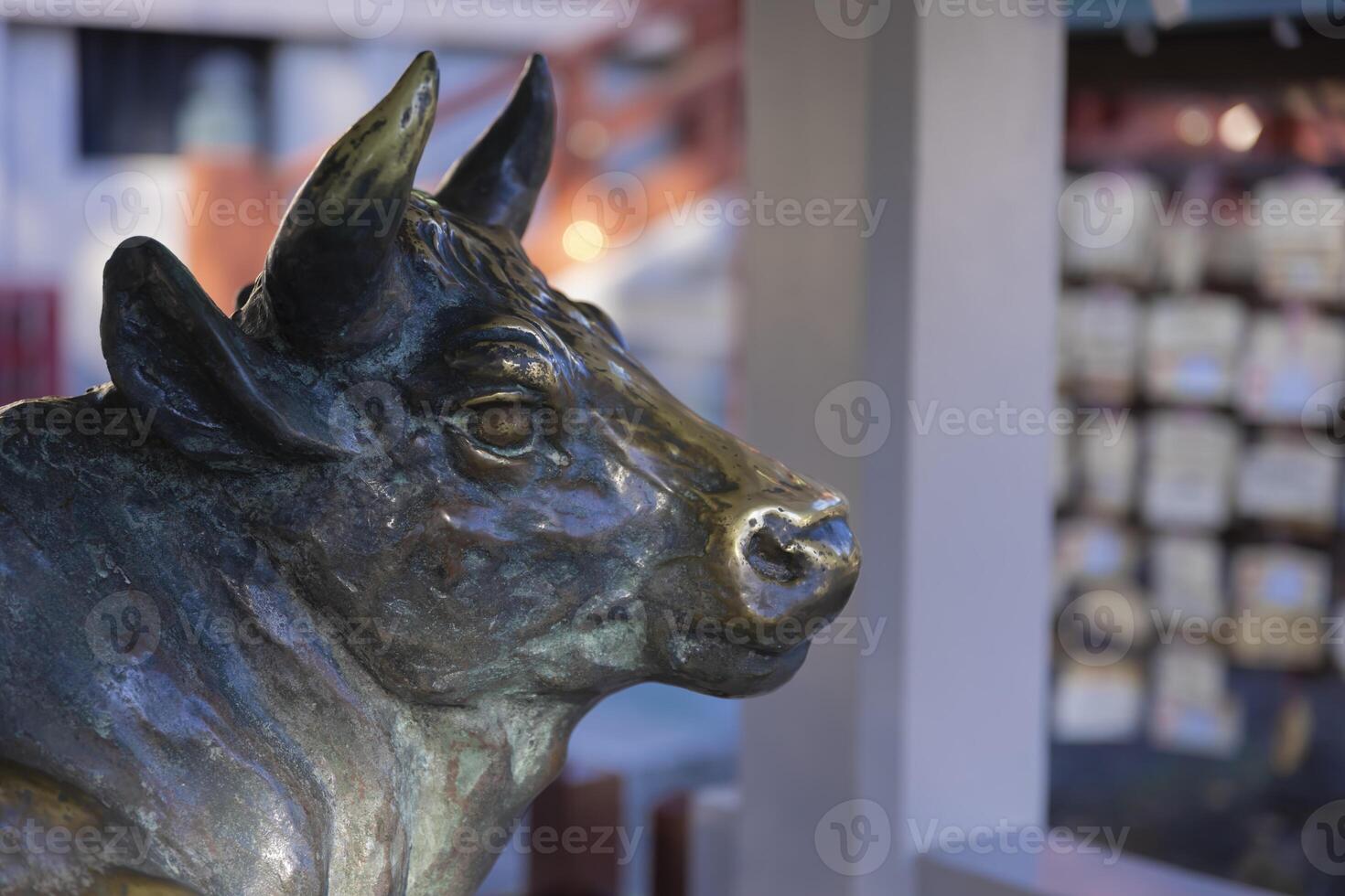 A guardian statue of cow at Kameido Tenjin shrine closeup photo