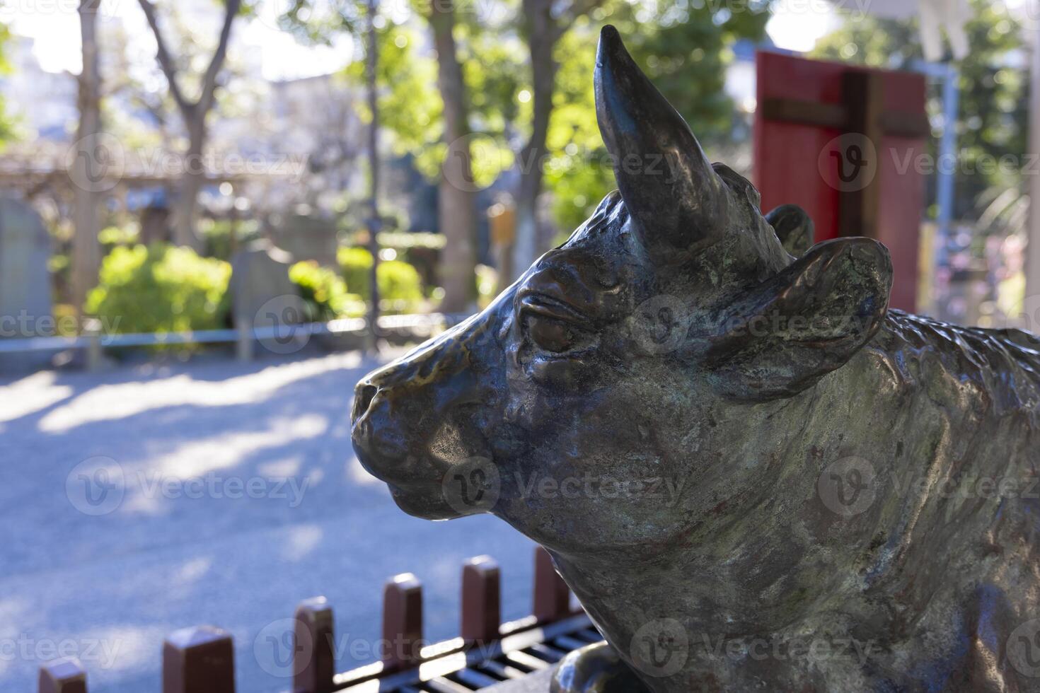 A guardian statue of cow at Kameido Tenjin shrine closeup photo