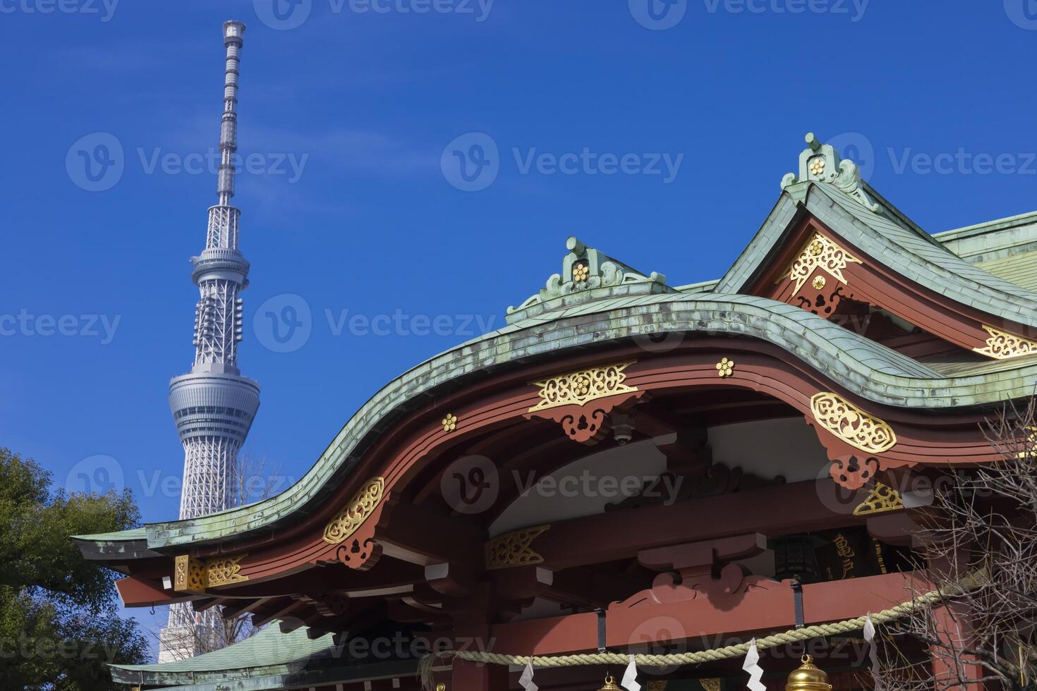 A main temple behind Tokyo sky tree at Kameido Tenjin shrine in Tokyo photo
