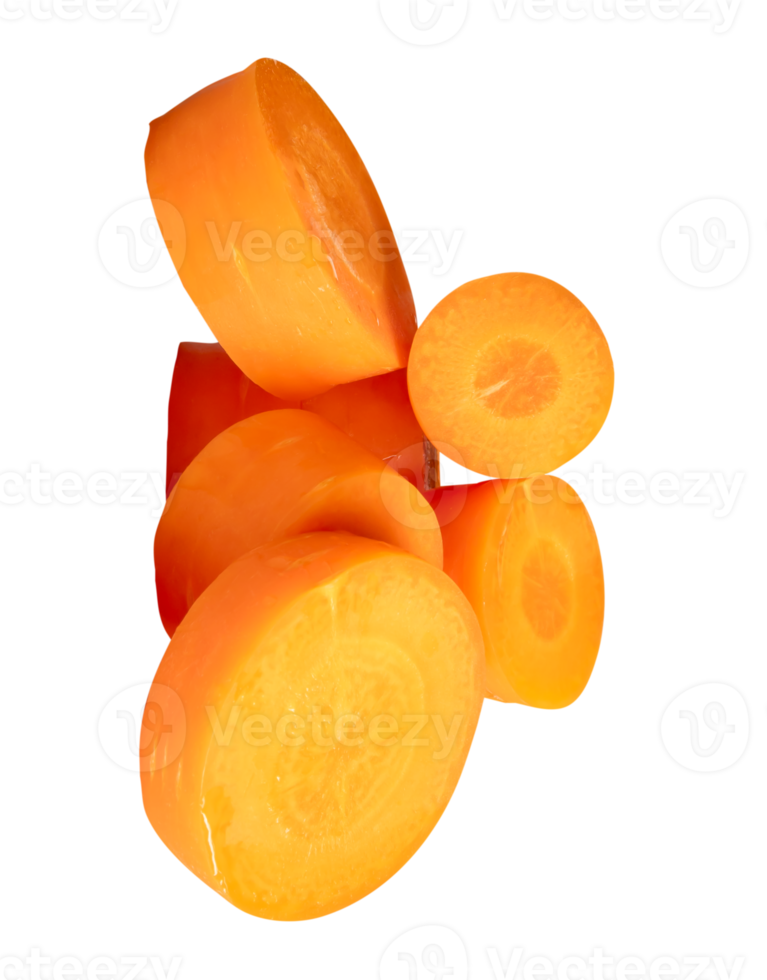 A pile of vibrant orange carrot slices in circle shape isolated with clipping path in file format png