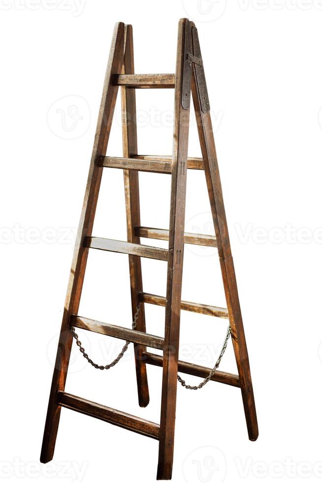 Wooden ladder isolated on white background. Double ladder with a chain in the middle photo