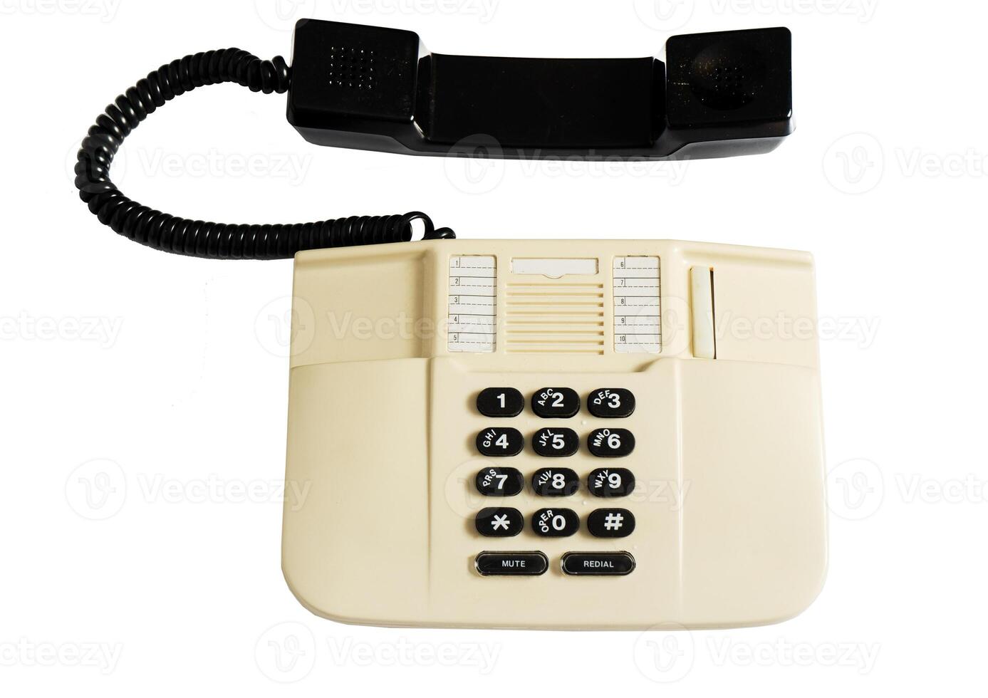 Landline corded push-button telephone isolated on white background photo