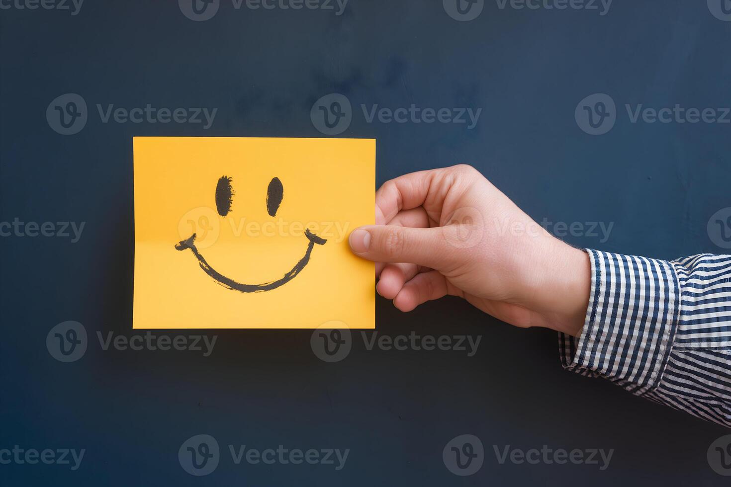 A yellow card with a smiley face creates a playful, cheerful tone photo