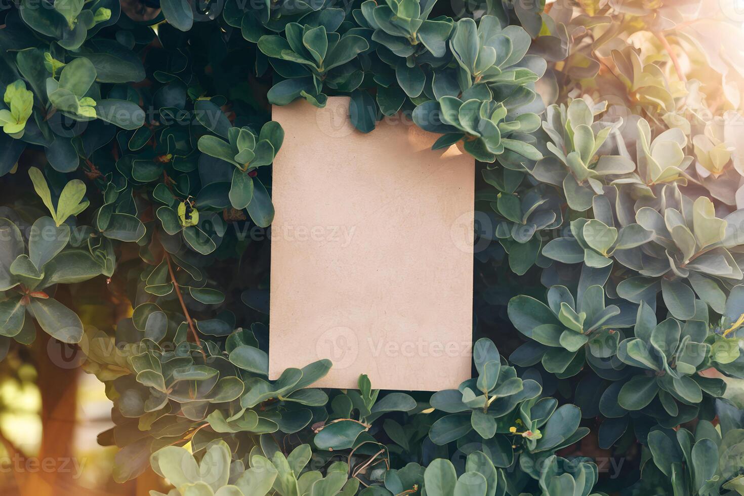 A brown card framed by green leaves invites creativity and warmth photo