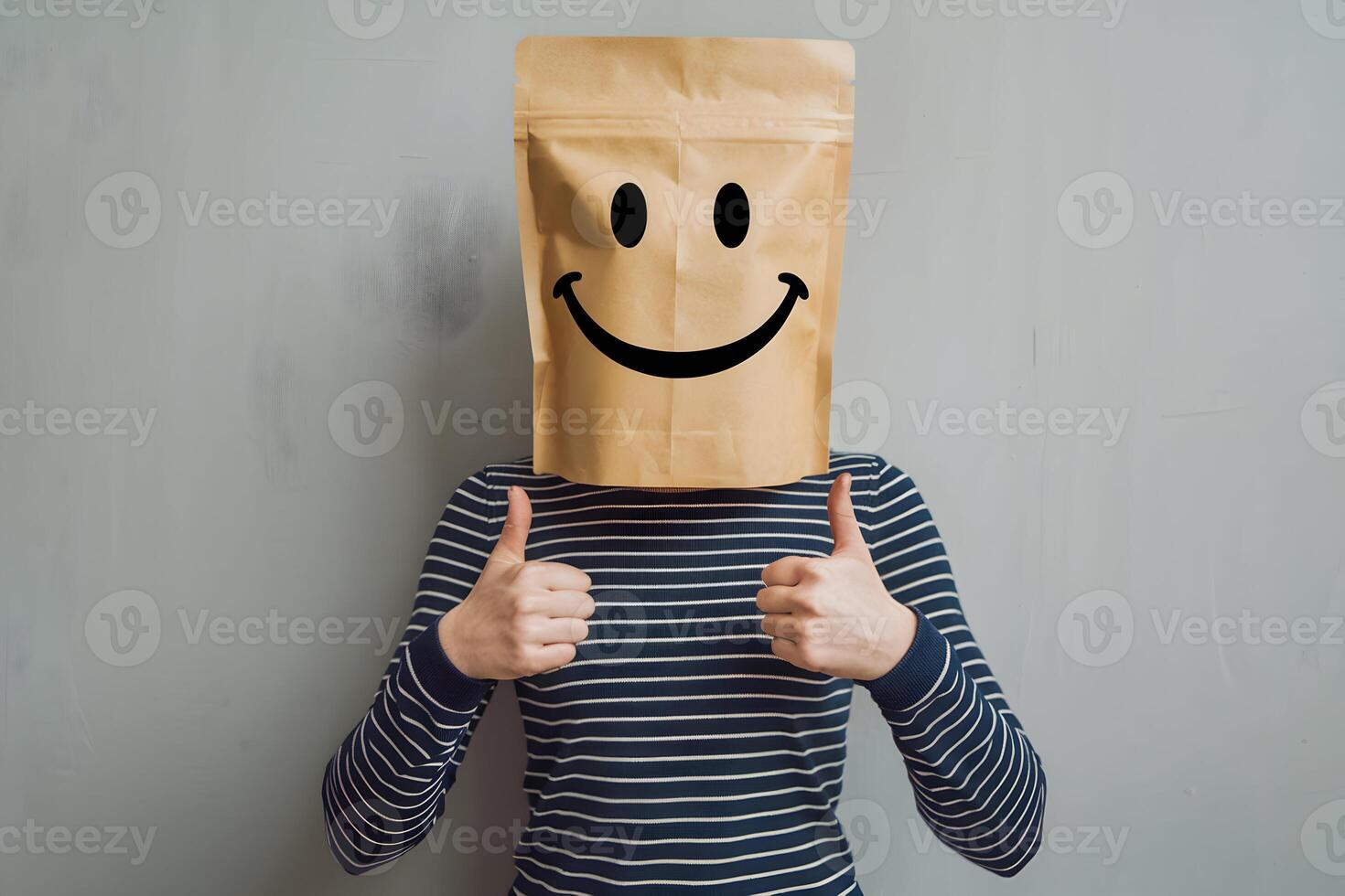 Paper bag smiley face and thumbs up create humor and anonymity photo