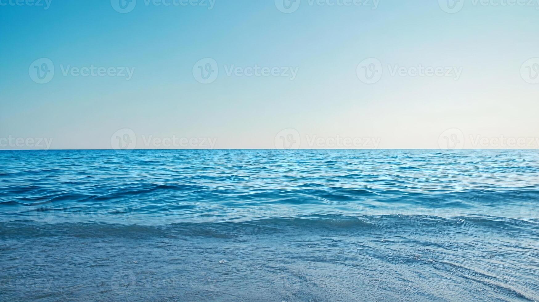 Calm Ocean Waves with Clear Blue Sky Peaceful Seascape Photography photo