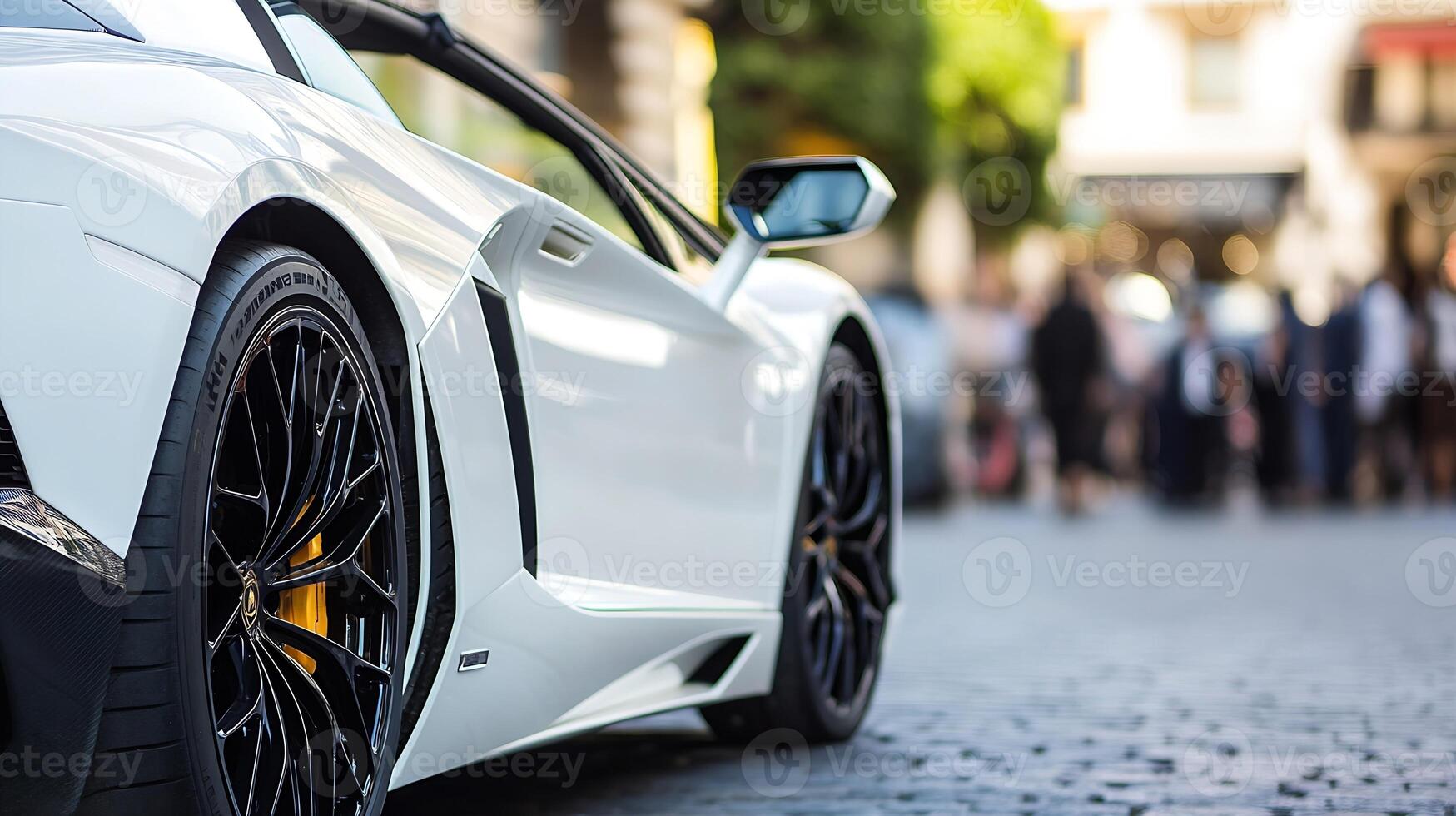 Luxurious white supercar parked on cobblestone street in upscale urban setting photo