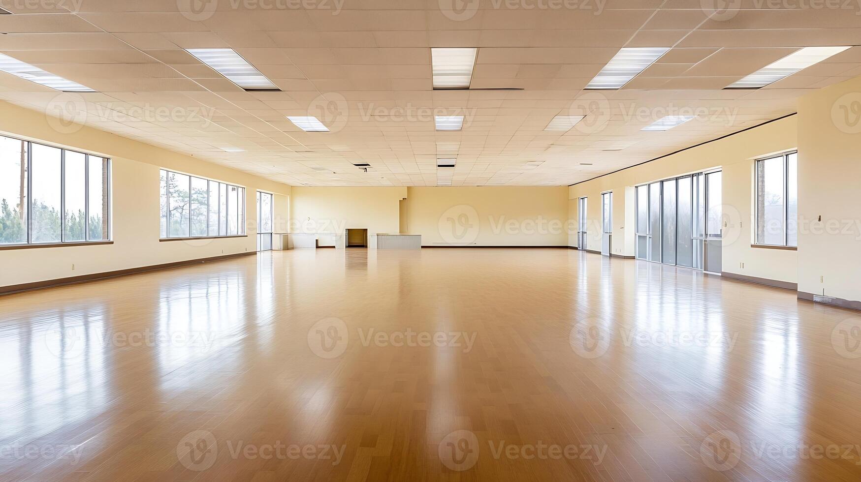 Spacious Sunlit Empty Room with Wooden Flooring Perfect for Events and Yoga Classes photo