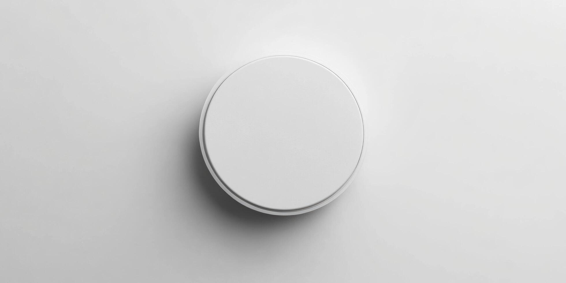 top view of white circular pill box on a white background photo