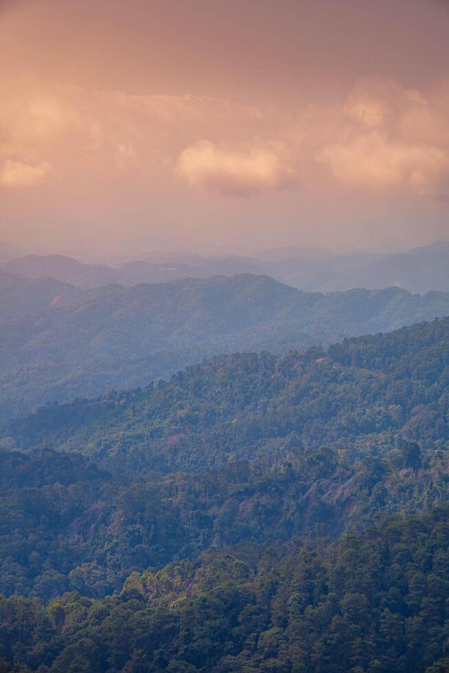 The layer of the top of the mountains in the background, Chaing Rai, Thailand. photo