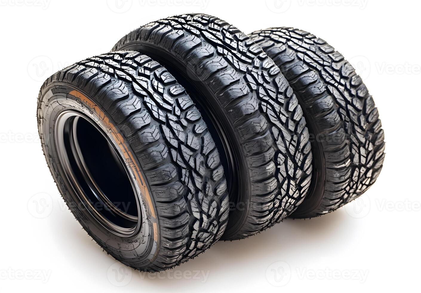 Three All Terrain Tires Stacked Together photo
