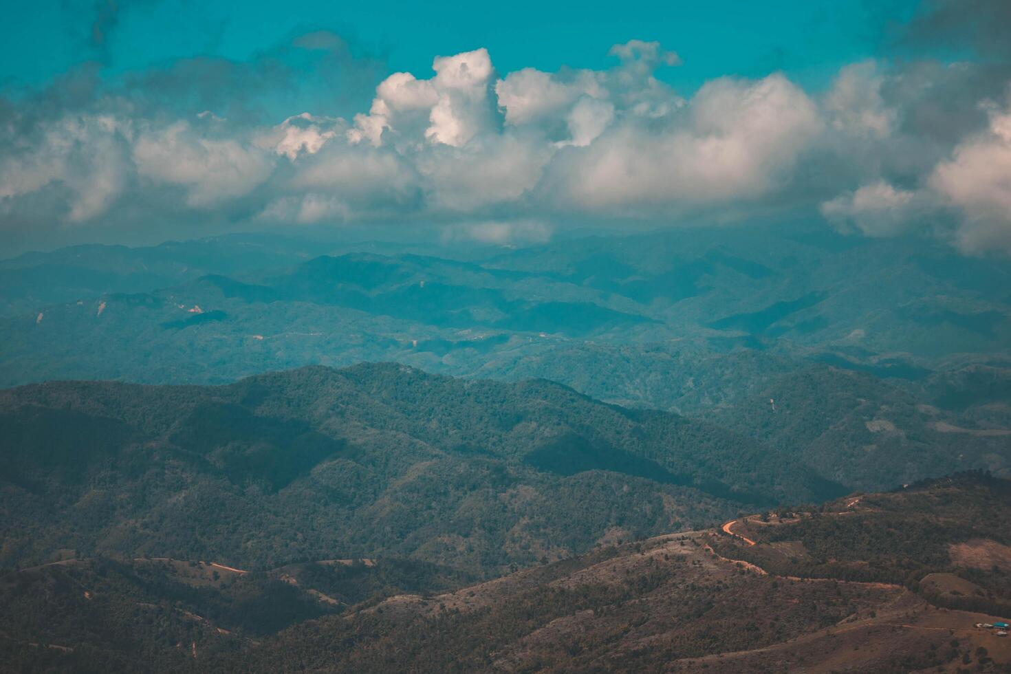 Foggy sky with the layers of mountains. Chiang Rai, Thailand. photo