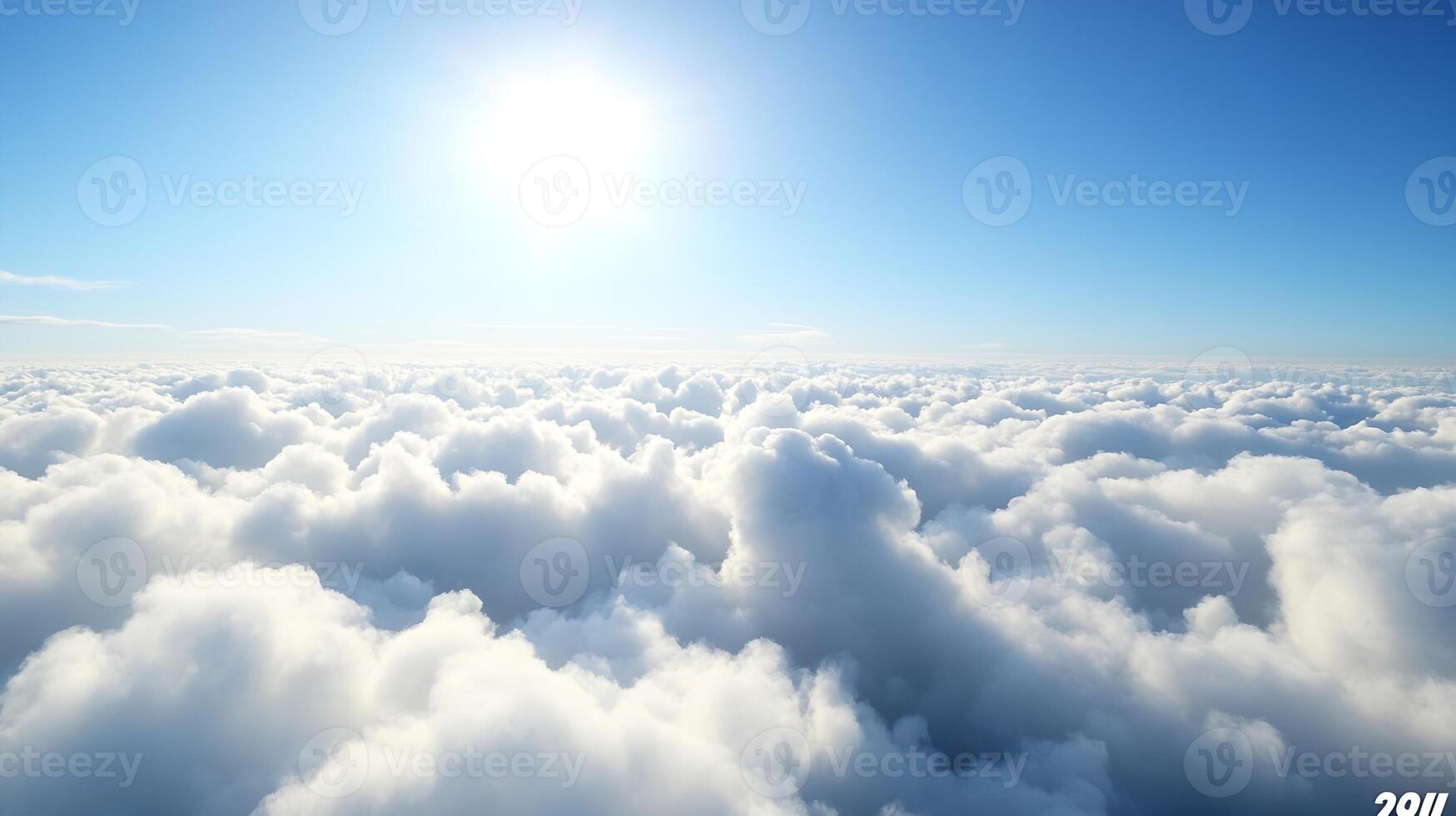Above the Clouds with Bright Sunlight Illuminating Expansive Cloudscape photo