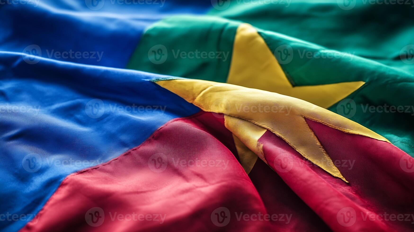 Vibrant Closeup of Colorful Fabric Flag with Star Emblem Swirling in Evening Light photo