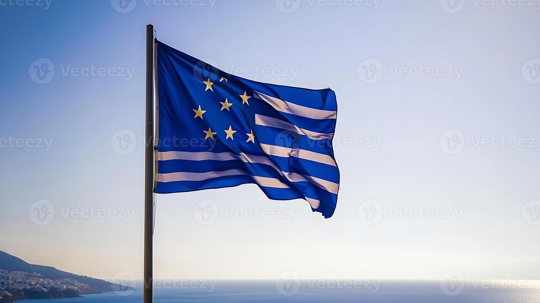 Beautiful Coastal Flag Waving Majestically Against a Backdrop of Clear Blue Sky and Picturesque Ocean photo