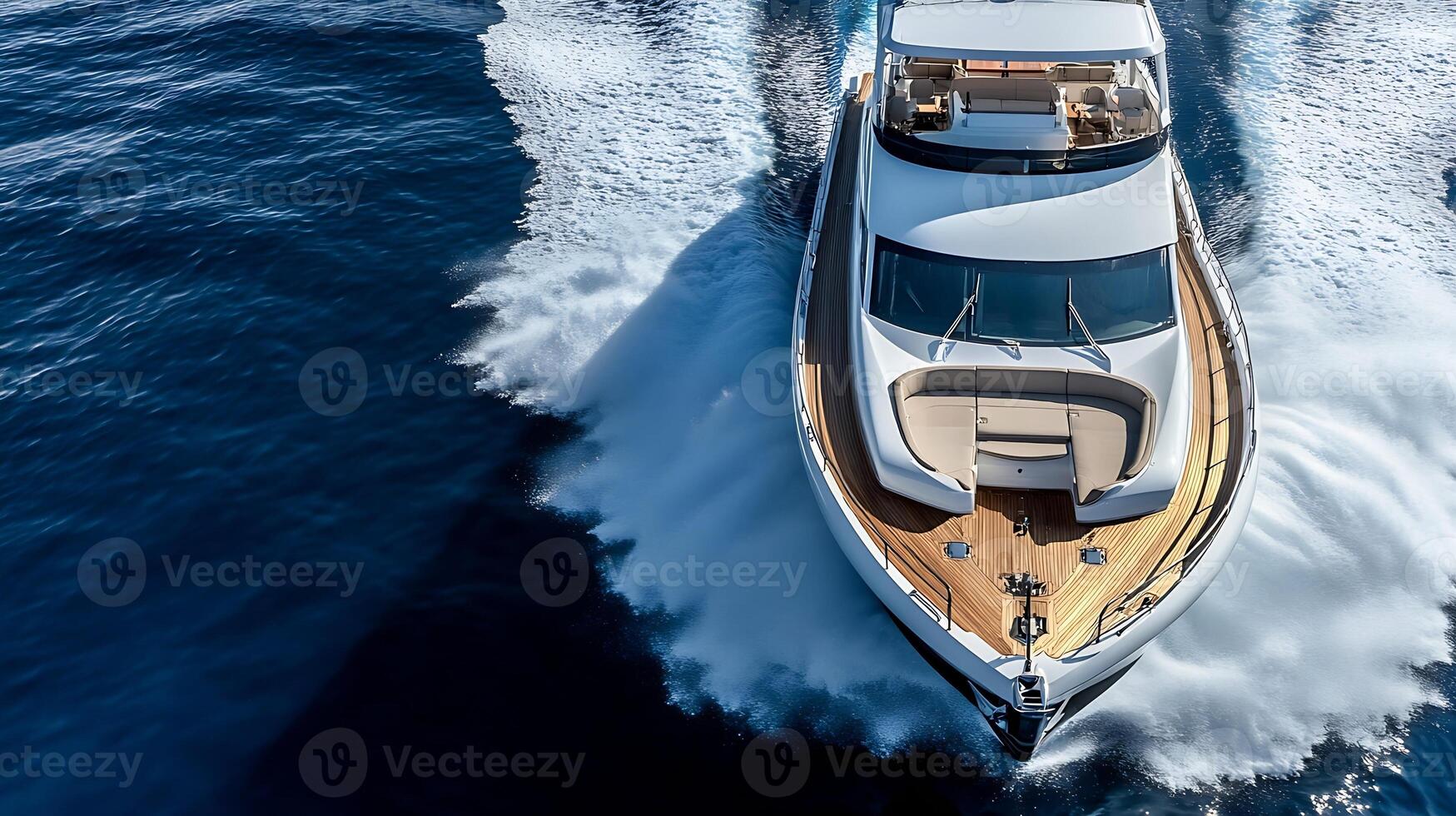 Luxury yacht cruising through open sea creating a dynamic water wake behind photo