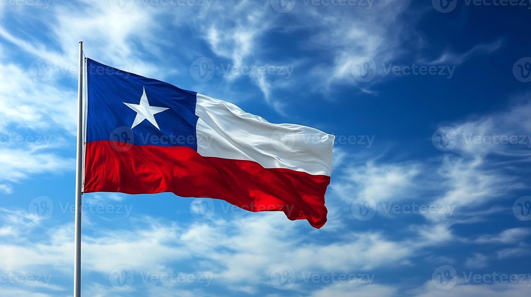 Chilean flag waving against clear blue sky on sunny day photo