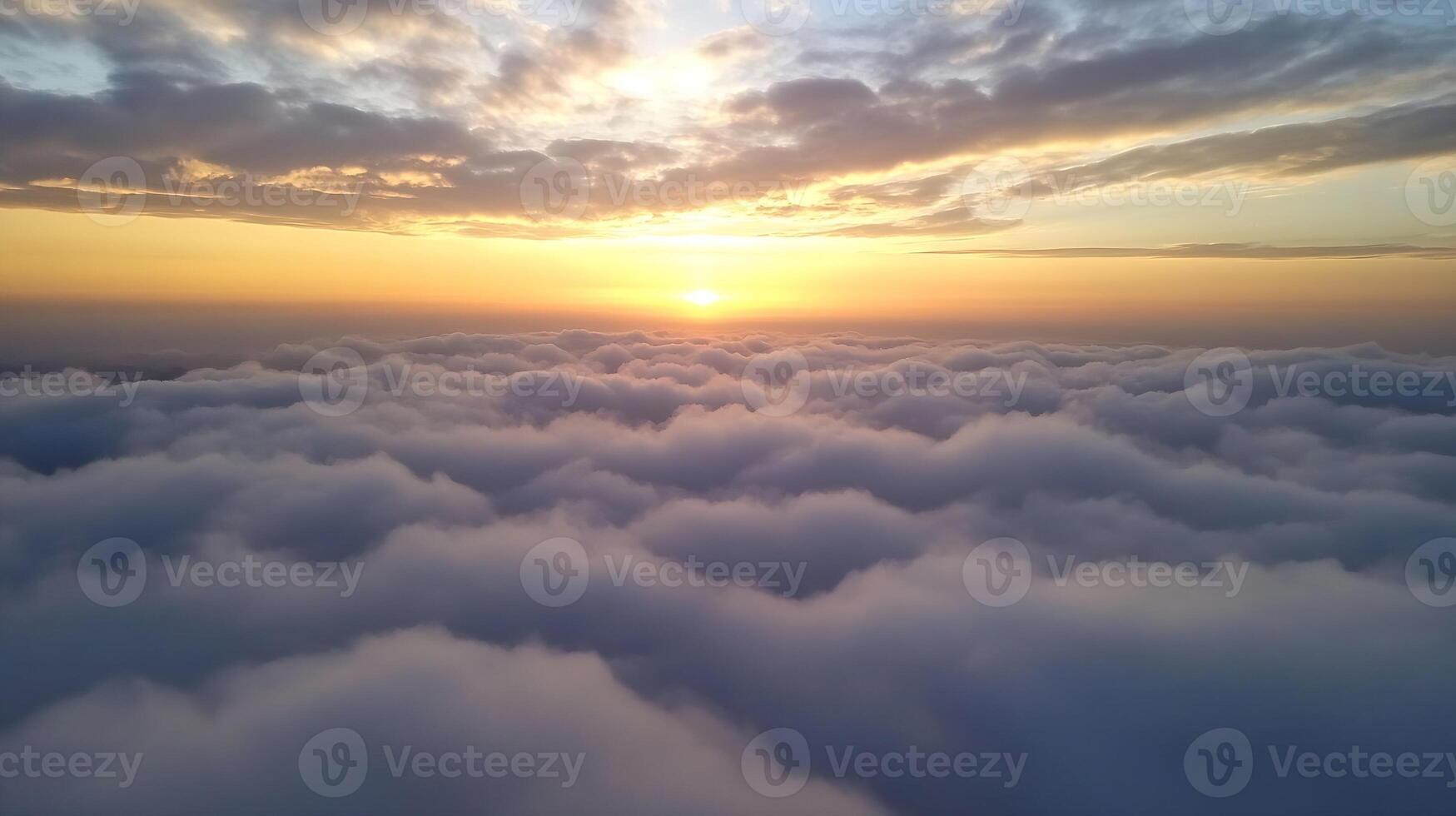 Majestic Aerial Cloudscape at Sunrise with Gentle Light Creating Dreamlike Atmosphere photo