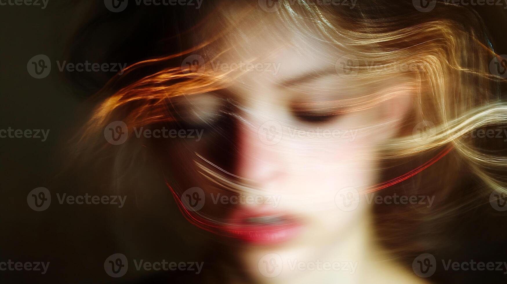 Artistic Blur of Female Portrait with Soft Focus and Ethereal Lighting photo