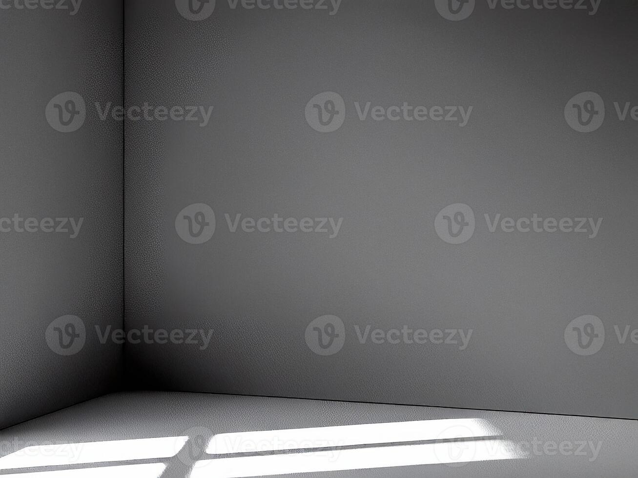 Empty room corner with window light creating shadows on floor photo