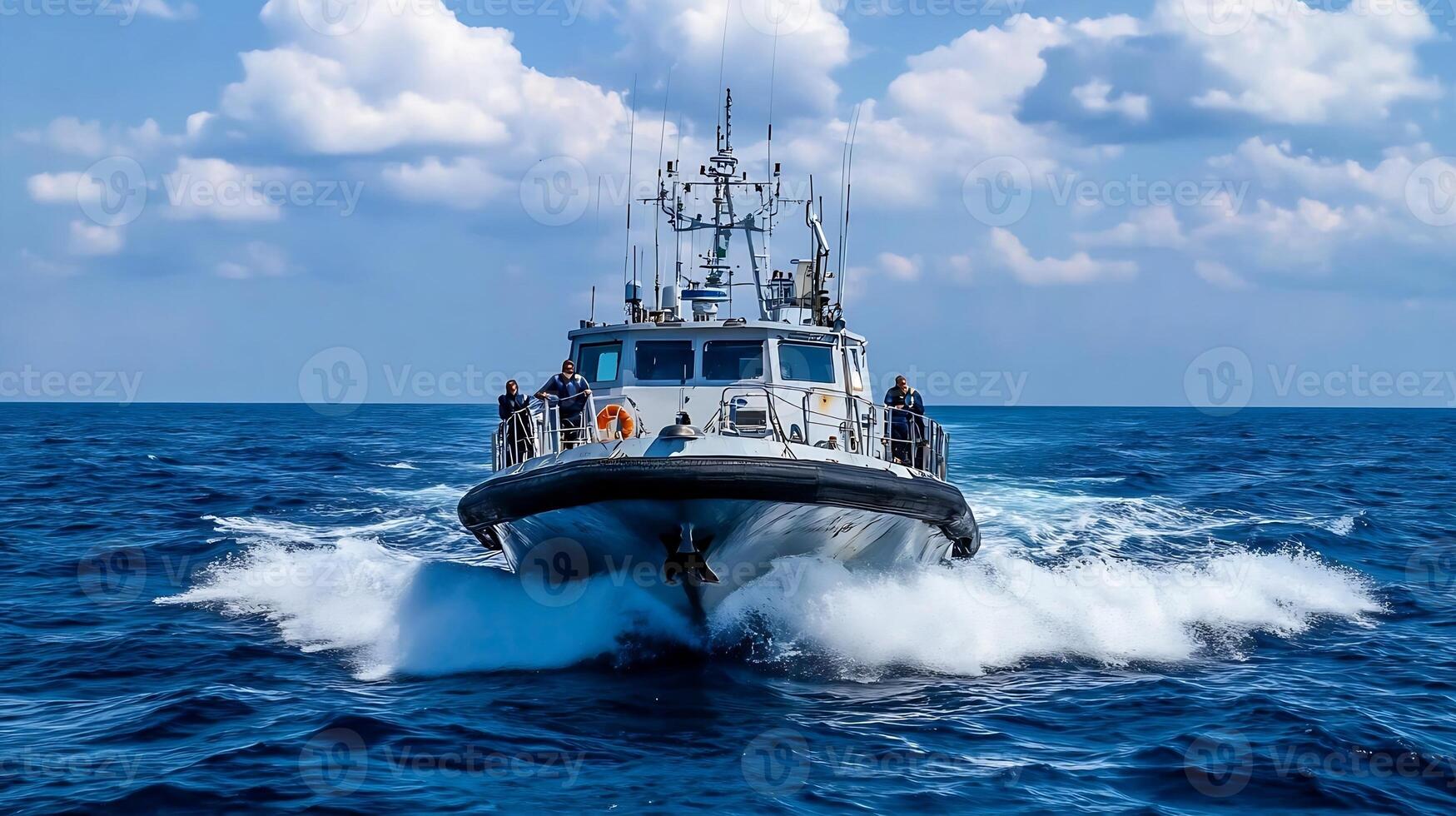 Dynamic snapshot of coast guard boat speeding across ocean waves photo