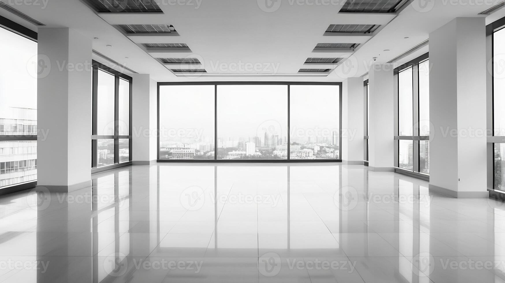 Sunlit Empty Office Space with Floor-to-Ceiling Windows Offering City Views photo