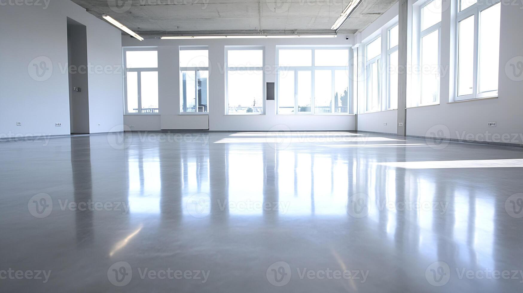 Bright Industrial Loft Space with Polished Concrete Flooring and Windows photo