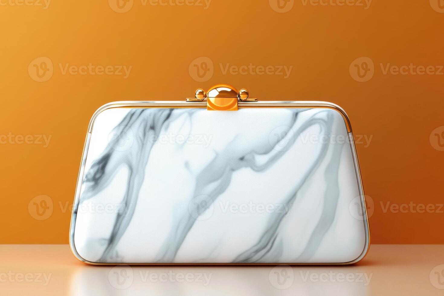 Elegant hard-shell clutch with marble pattern in shades of white and gray against a vibrant backdrop photo
