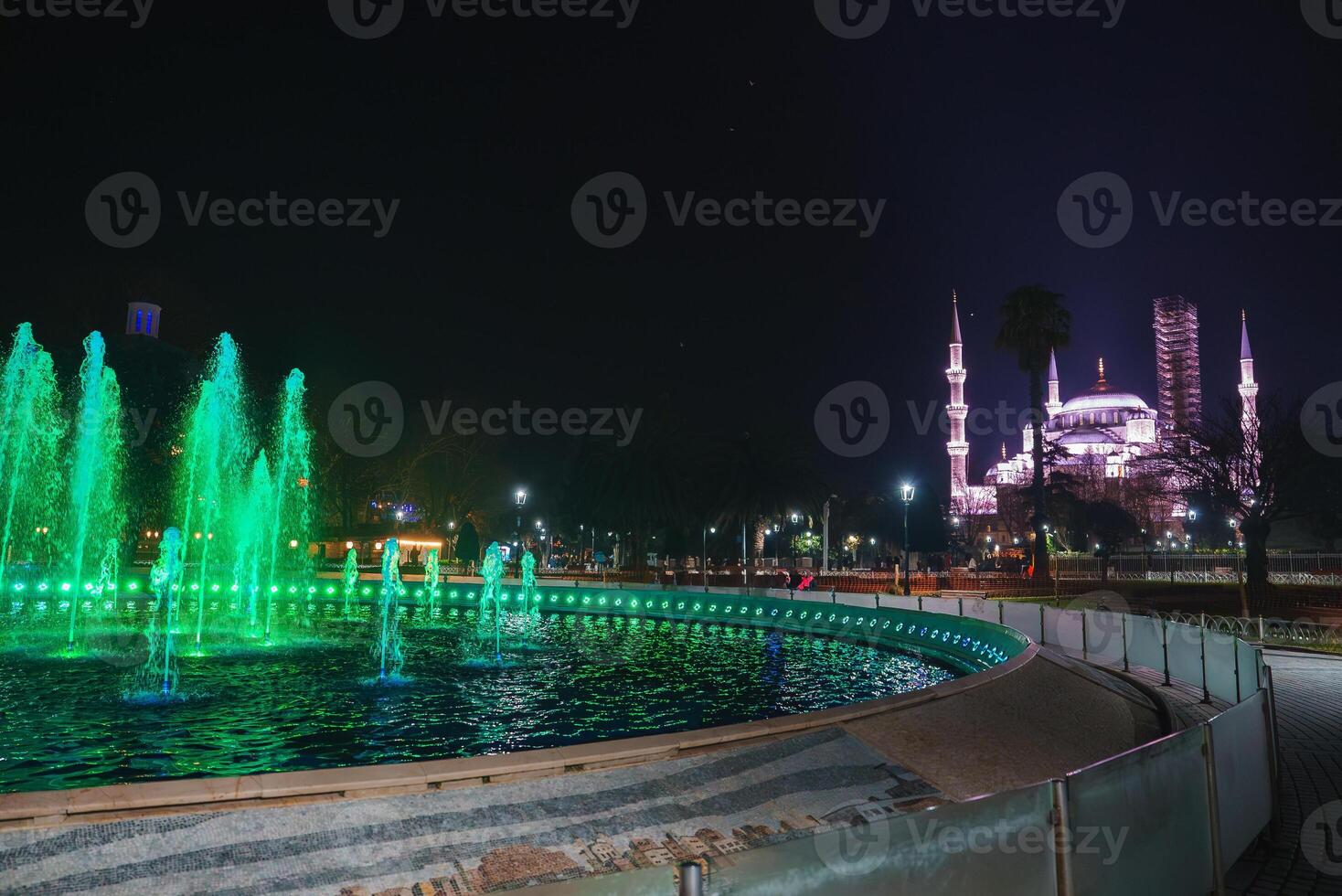 Nighttime View of Sultan Ahmed Mosque and Illuminated Fountain photo