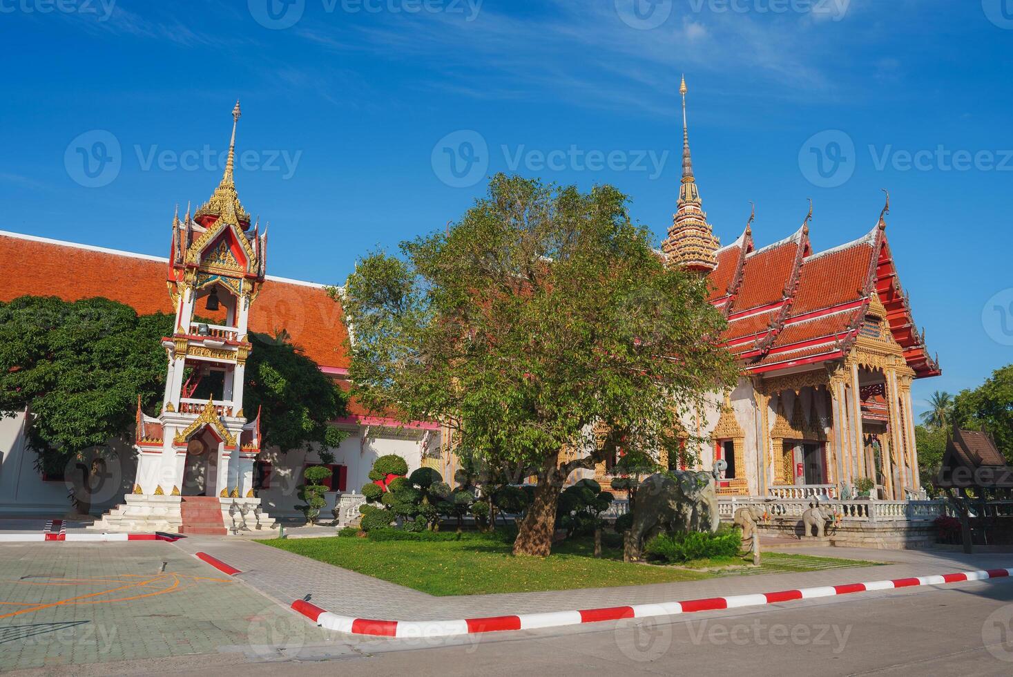 Wat Chalong Temple with Bell Tower and Manicured Grounds in Phuket photo