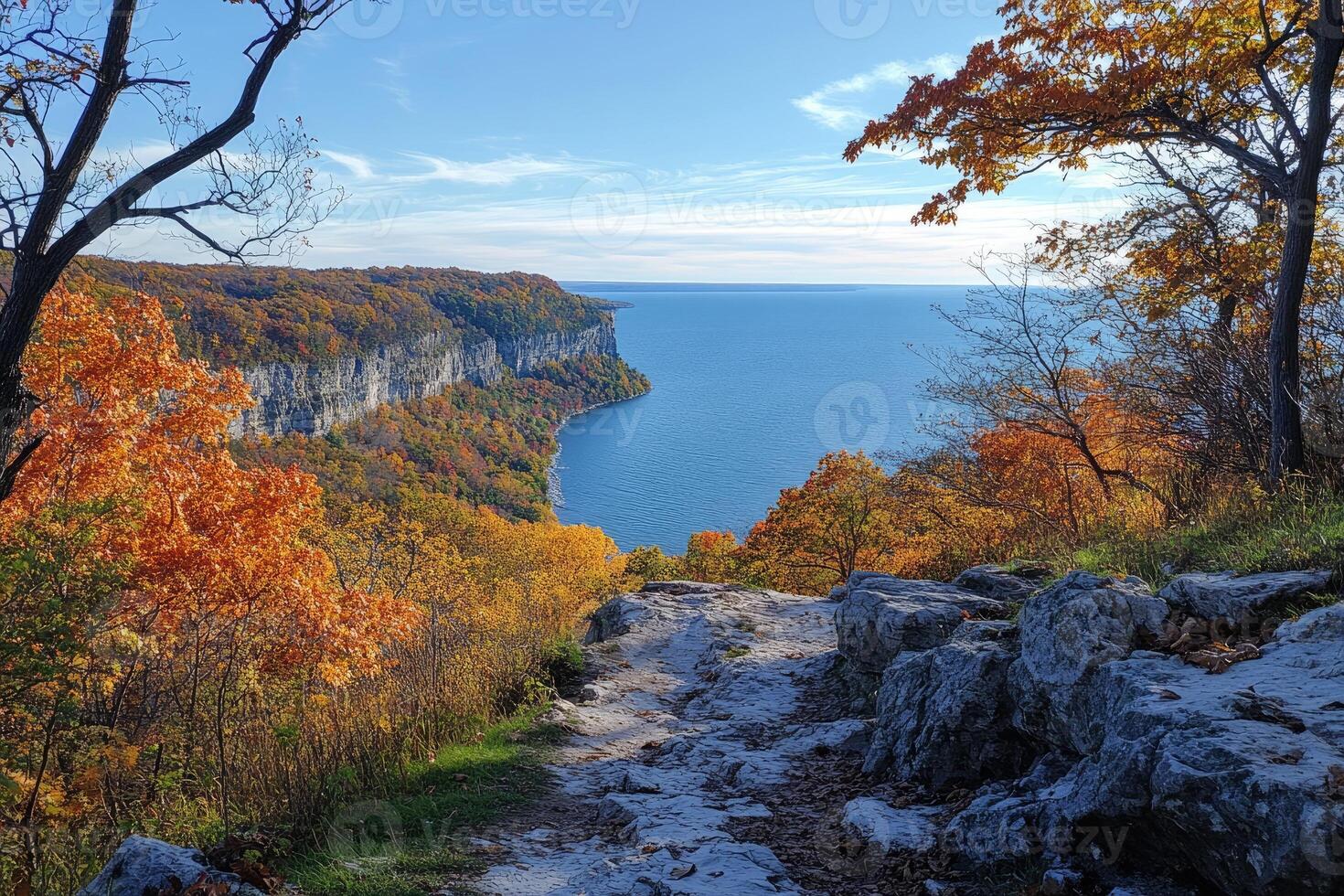 Hiking trail overlooking georgian bay in autumn, lions head provincial park, ontario, canada photo