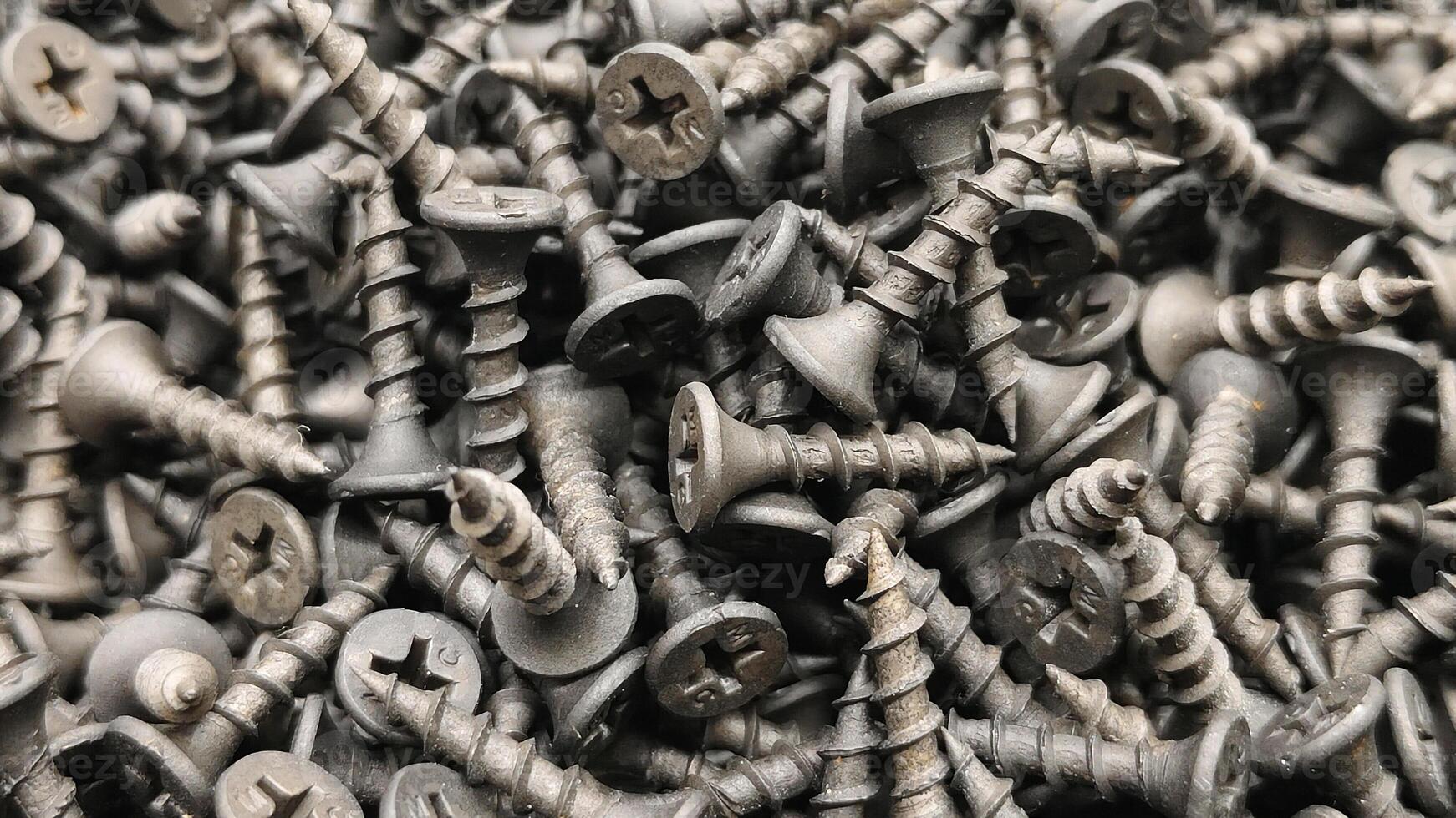 steel self-tapping screws for working with wooden products banner , self-tapping screws for attaching objects to wooden objects, for repair work, hardware store, construction, carpentry, joinery photo