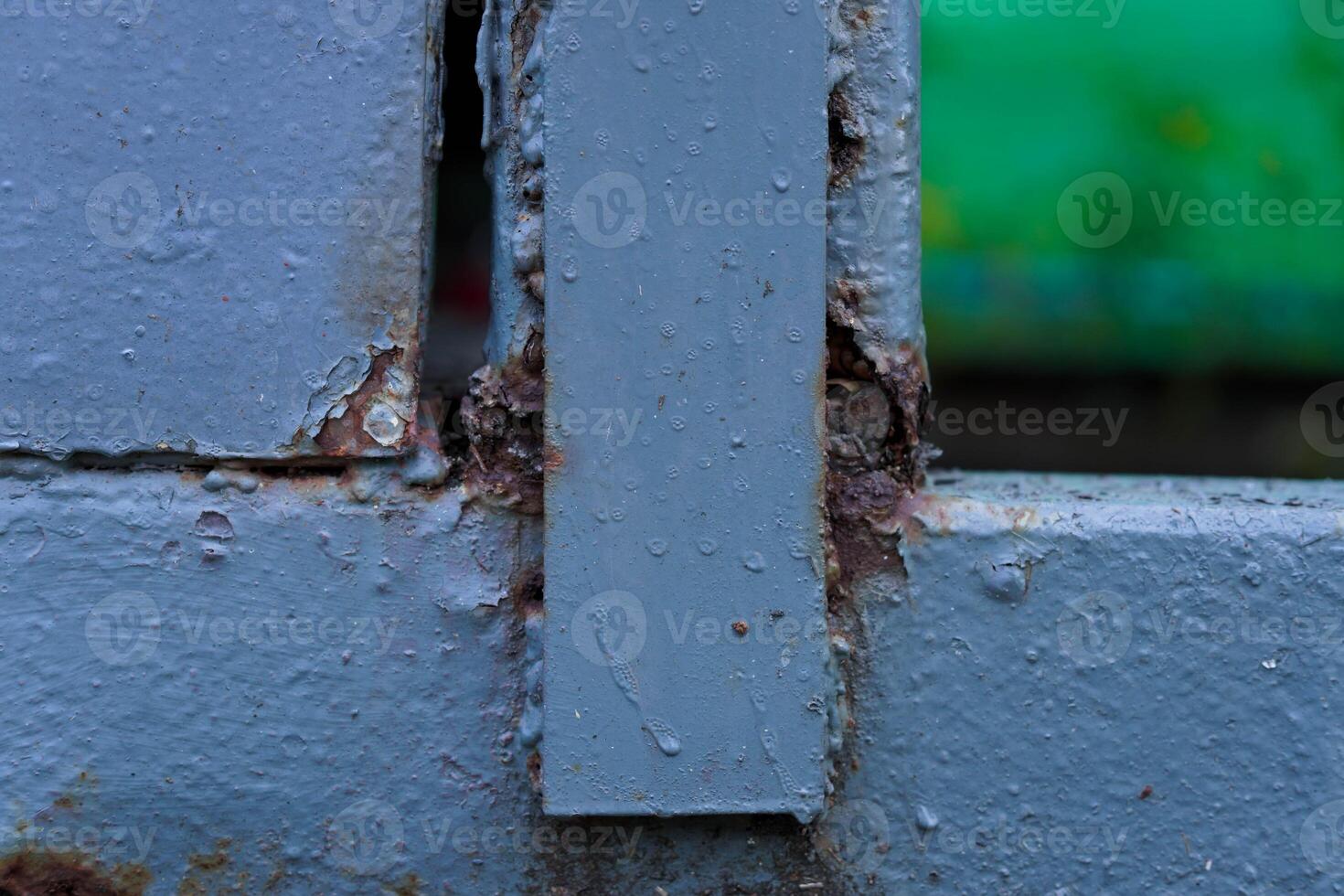 Close-up of a rusty iron door. photo