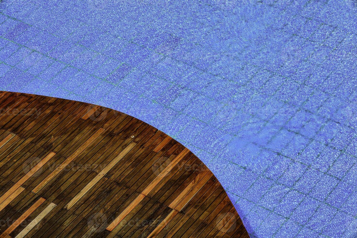 Wooden floor by the swimming pool photo