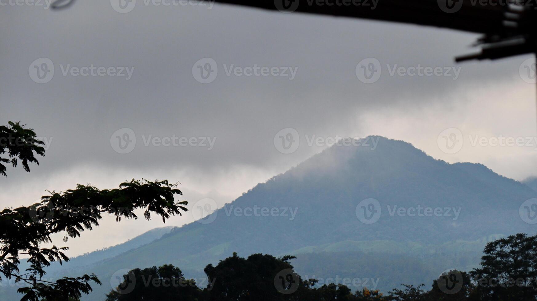 Mountains clouds grey sky photo