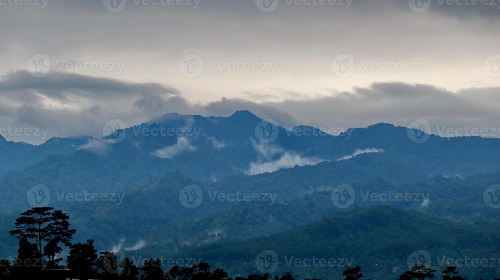 The shades of the mountains. Nature mountains clouds grey sky photo