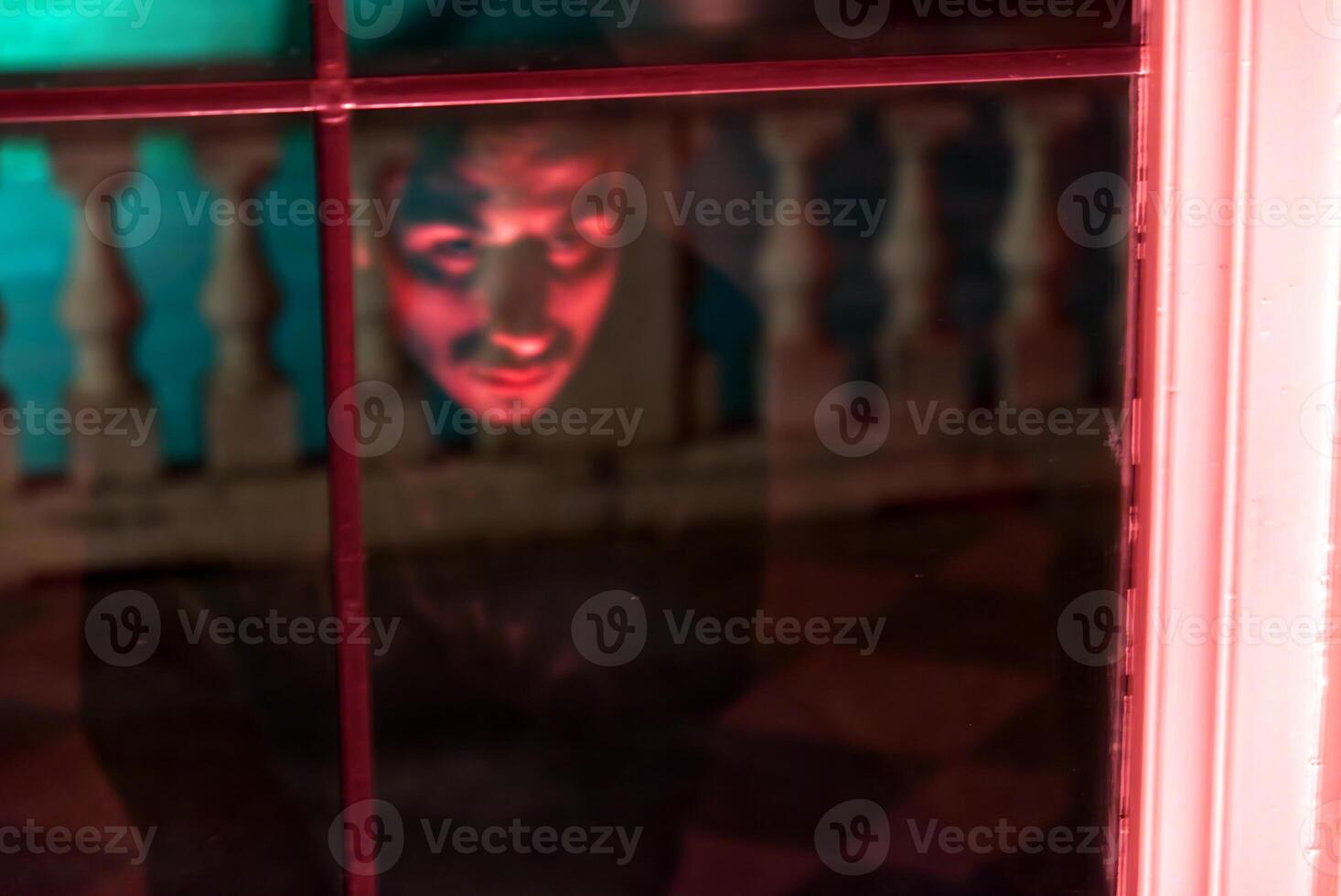 ghostly apparition reflected in a window photo