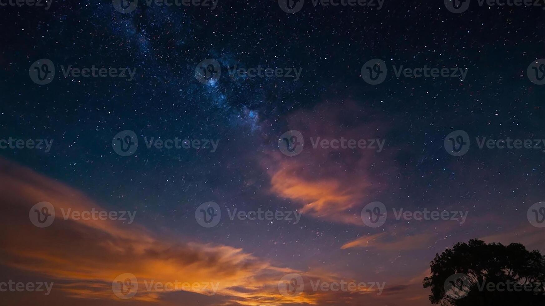 Twilight Blues and Oranges Merging into Starlit Night photo