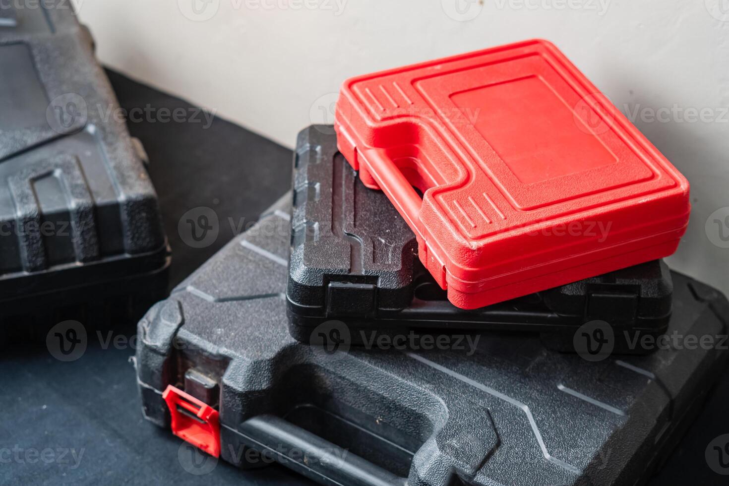 Stack of Tool Cases with Red and Black Colors photo