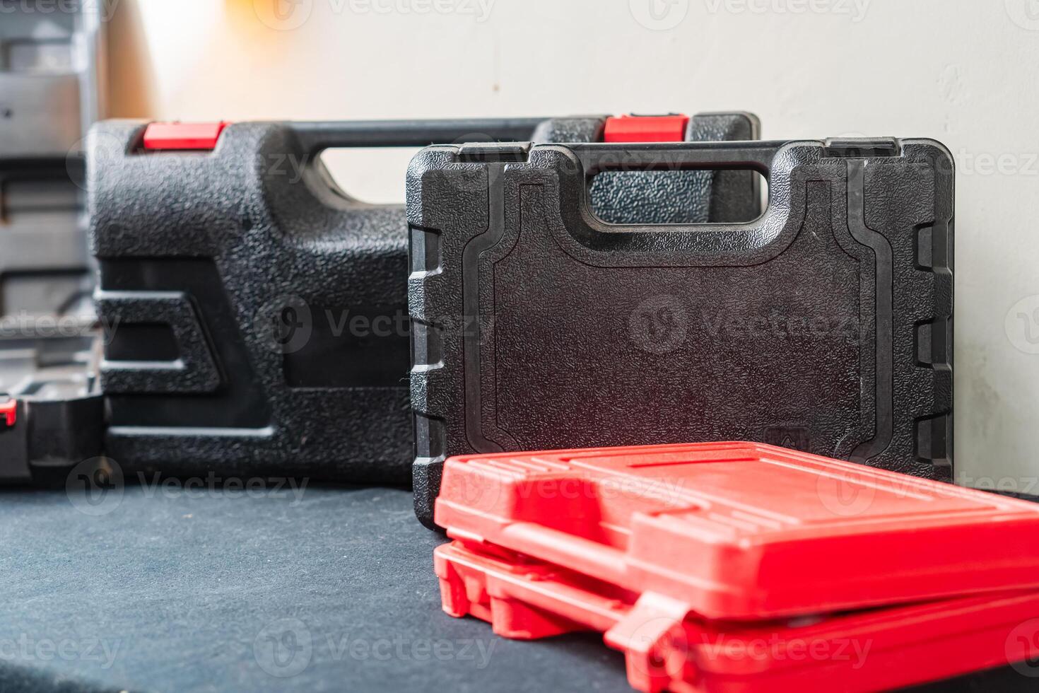 Collection of Tool Cases in a Workshop Setting photo
