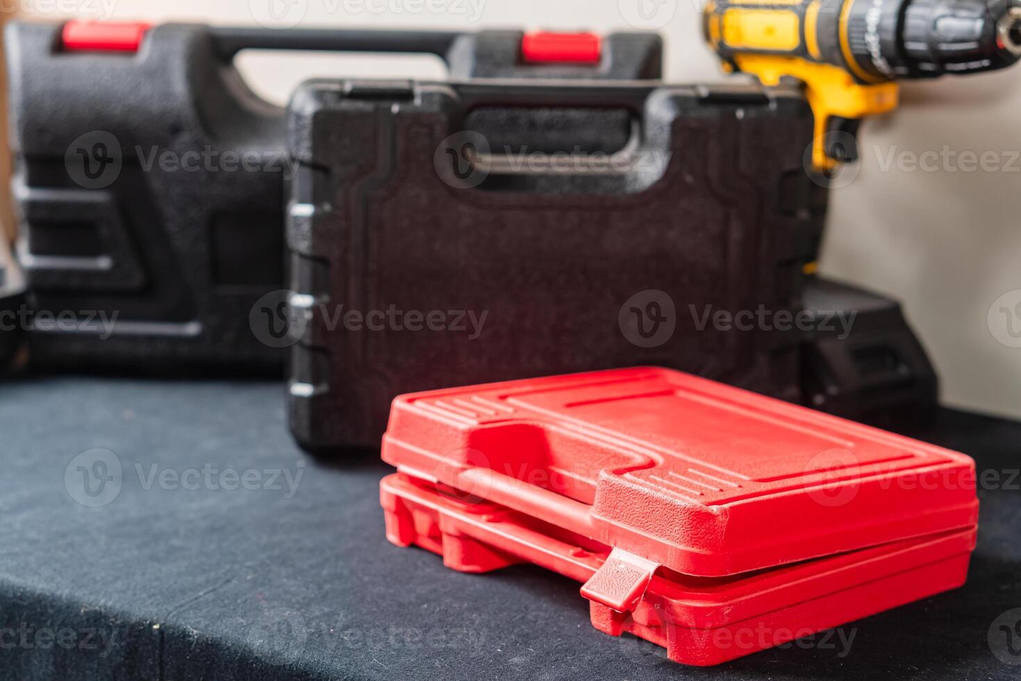 Collection of Tool Cases on a Workbench photo